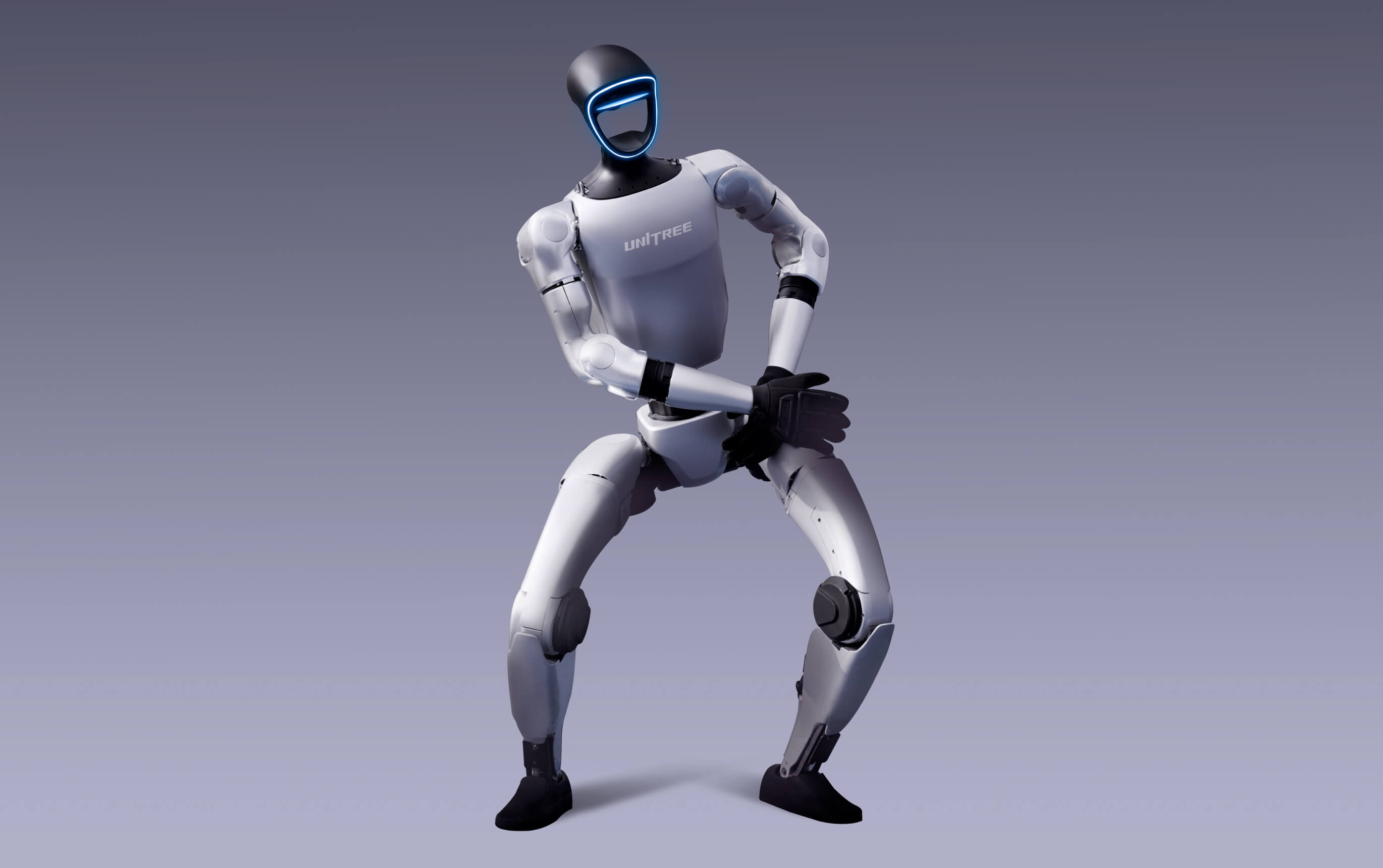 Unitree G1 humanoid robot in a dynamic motion pose.